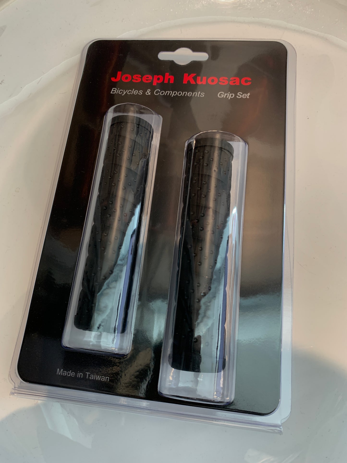 Joseph Kuosac Grips