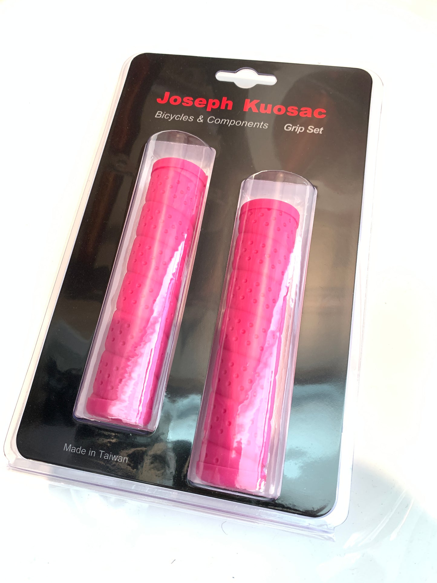 Joseph Kuosac Grips