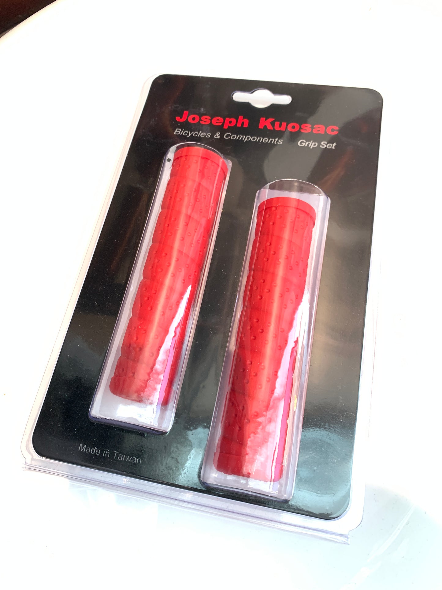 Joseph Kuosac Grips